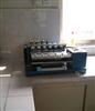 Flocking resistant abrasion machine